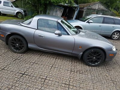 Mazda-MX5-Euphonic-soft-top-and-hard-top.jpg
